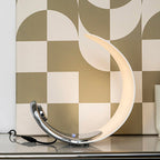 Liora Curved Table Lamp With Elegant Swirls And Soft Glow | Veisp