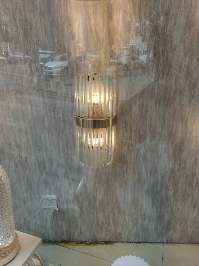 LumaLuxe Elegant Gold Wall Sconce With Warm Ambient Glow | Veisp