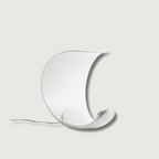 Liora Curved Table Lamp With Elegant Swirls And Soft Glow | Veisp